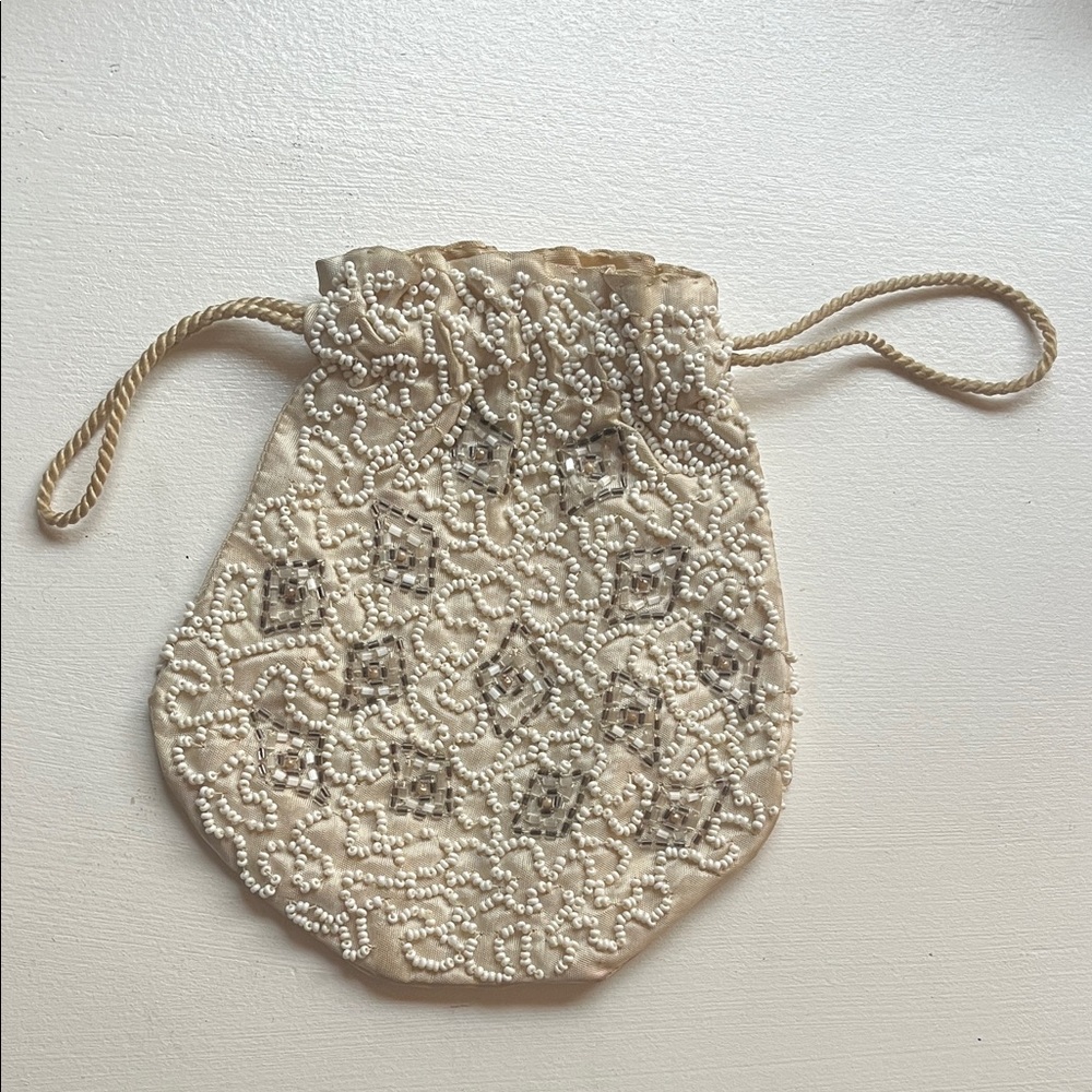 Elegant Cream Beaded Drawstring Bag